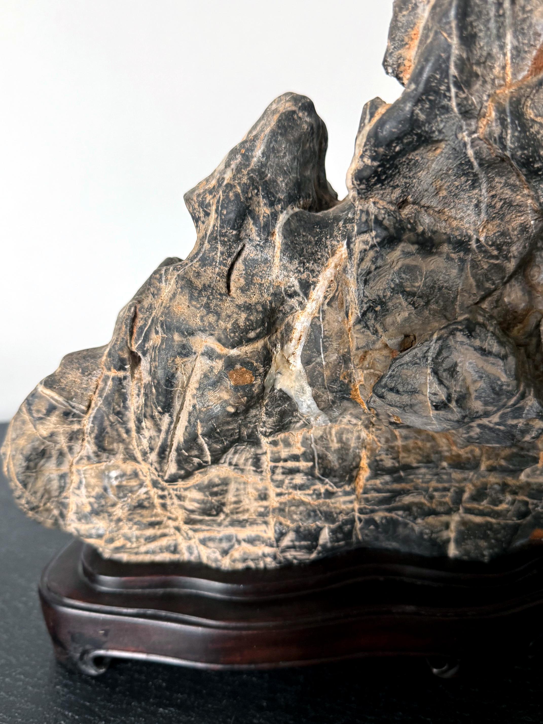 Large Chinese Horizontal Gray Lingbi Scholar Stone with Grotto on Display Stand For Sale 3