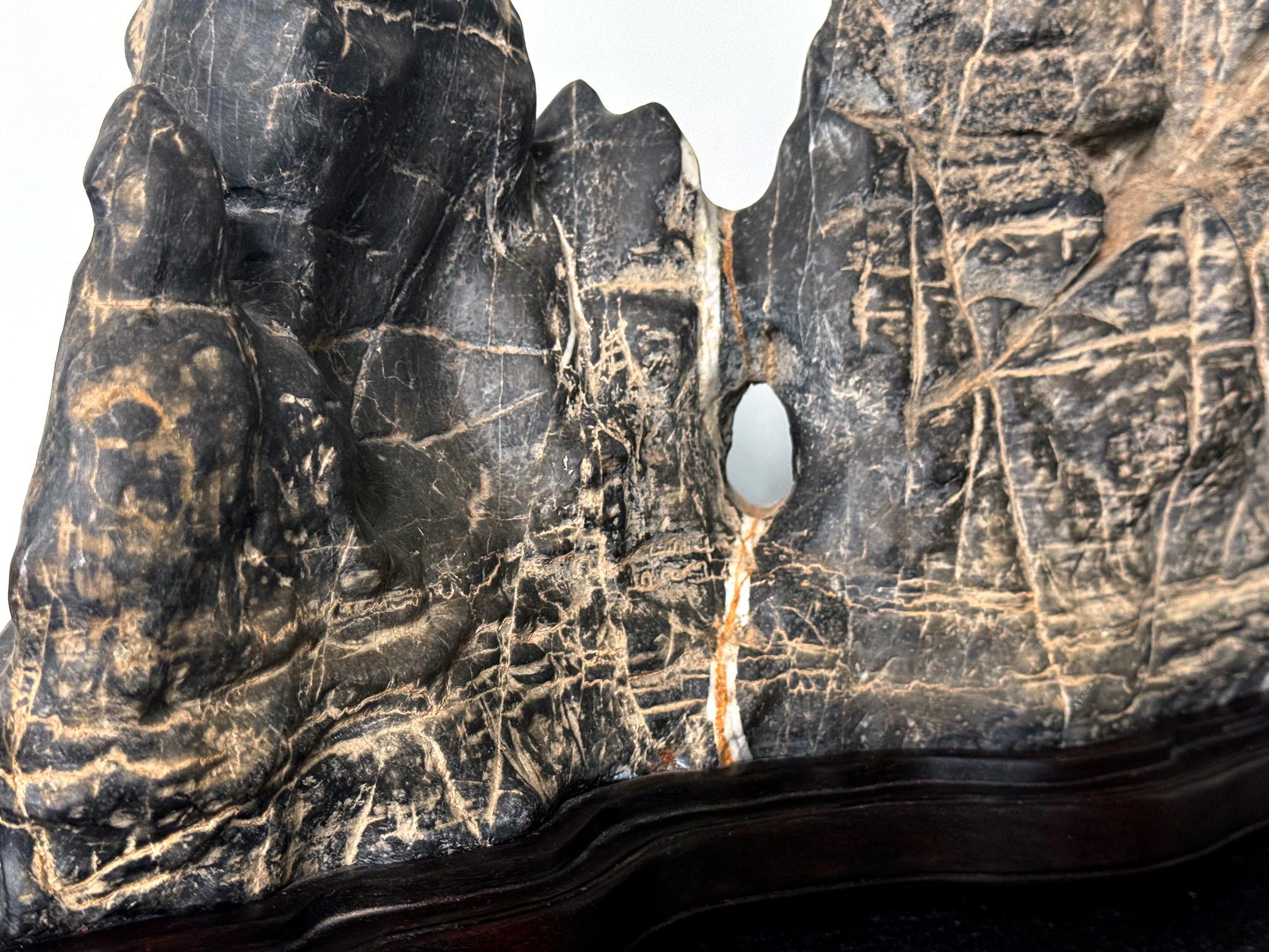 Large Chinese Horizontal Gray Lingbi Scholar Stone with Grotto on Display Stand For Sale 4