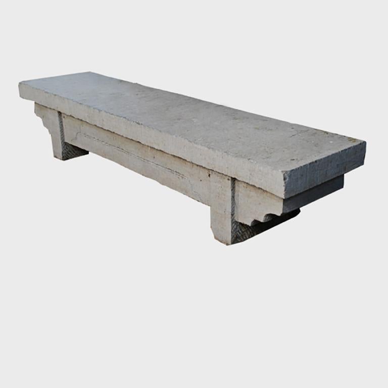 This simply designed doon bench from China's Shanxi province is carved by hand from a single block of limestone. With a strong, low profile and subtle stepped spandrels, the bench honors the balanced proportions and minimal forms characteristic of