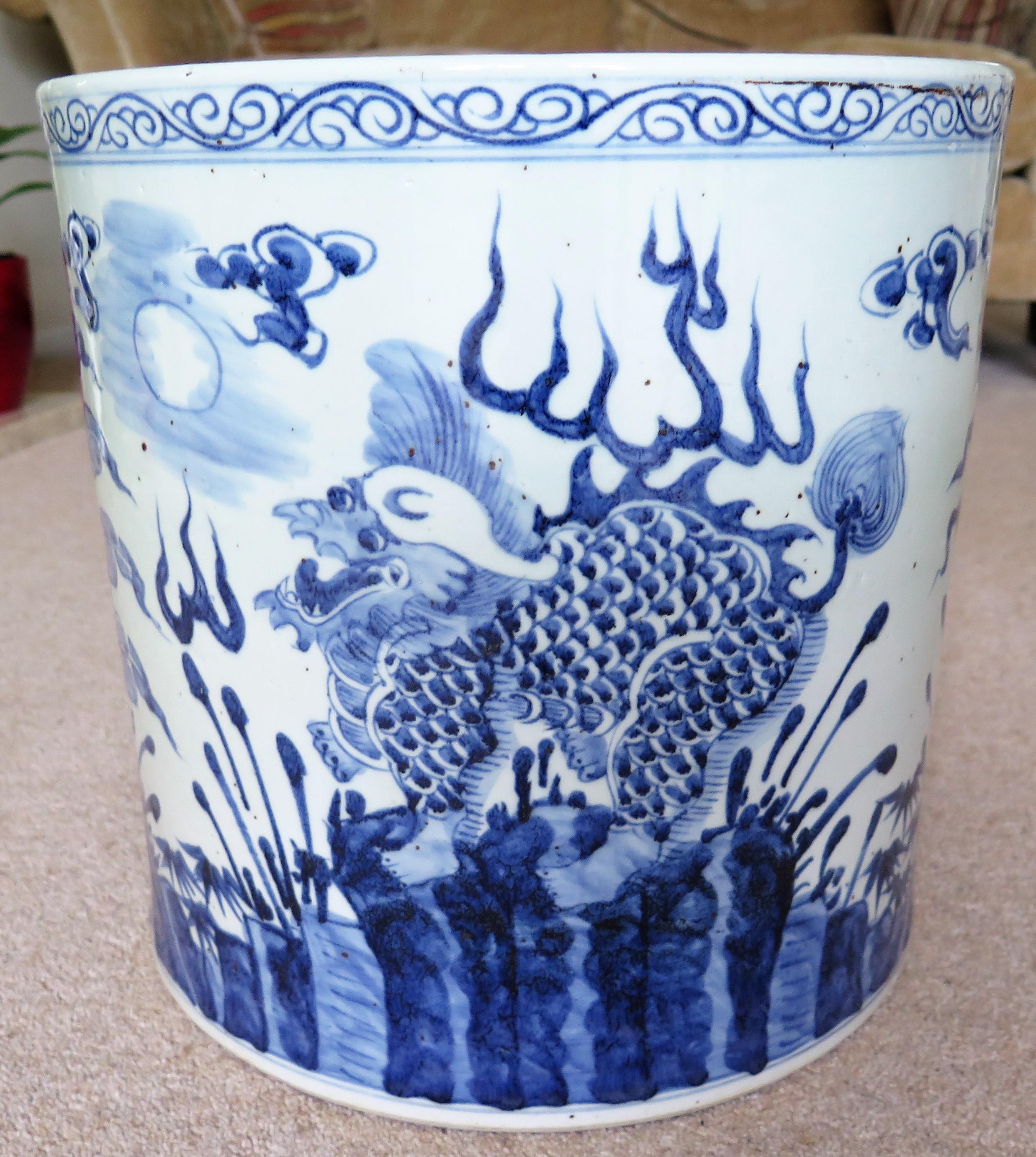 This is a very large Chinese porcelain Jardiniere, Planter, Cache Pot, Vessel or Jar, Hand potted and painted in a striking blue and white pattern and dating to the mid 20th century.

The Jardiniere, vessel or jar has a lovely shape and is hand
