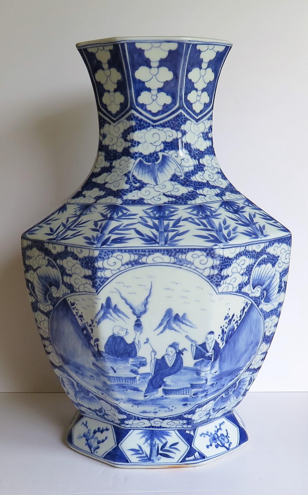 This is a very impressive and beautifully hand painted porcelain Chinese baluster Vase raised on a footed base and dating to the early 20th century, circa 1920.

This vase has an interesting octagonal shape raised on a low foot and with a slightly
