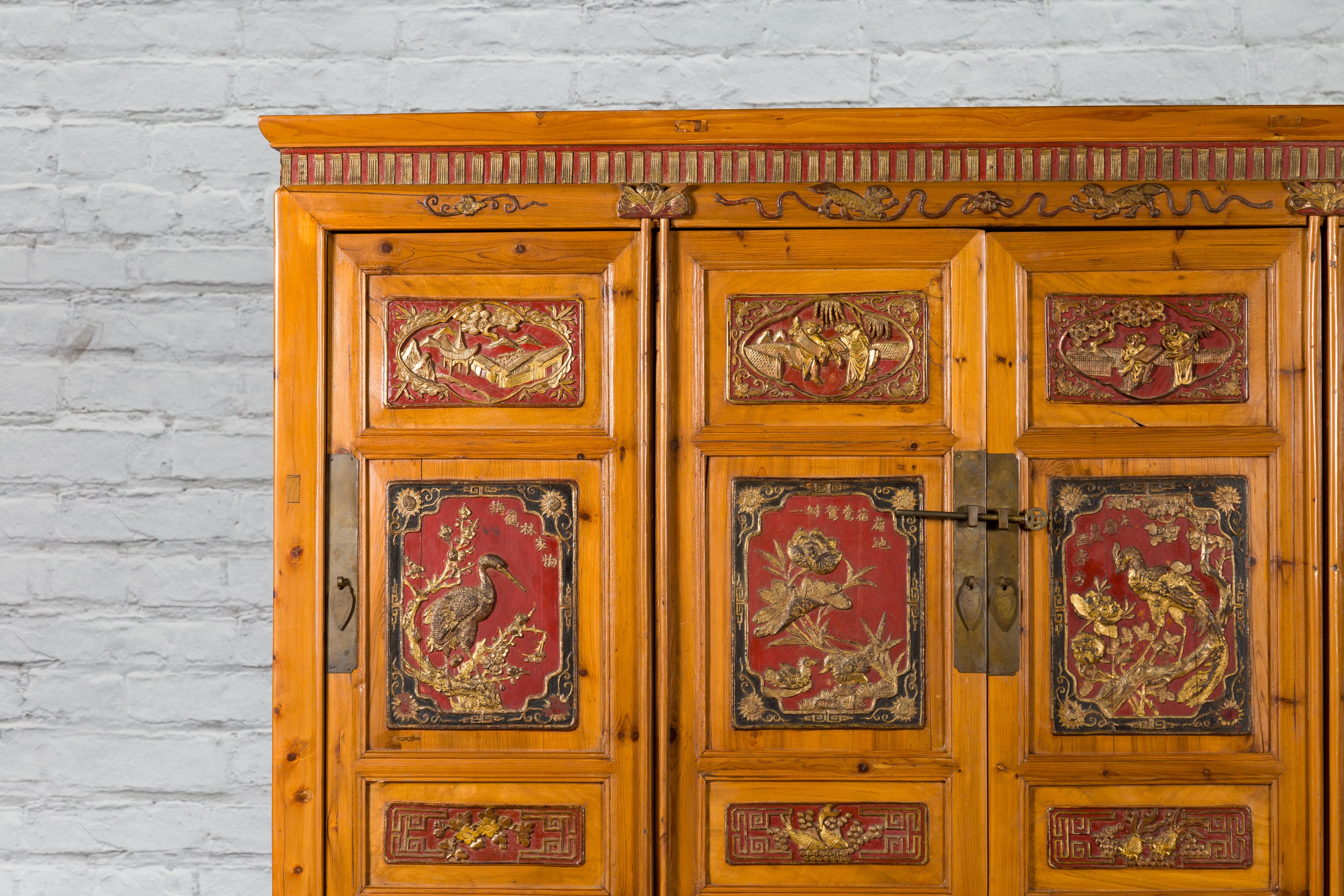 Large Chinese Qing Dynasty 19th Century Cabinet with Hand-Carved and Gilt Panels In Good Condition For Sale In Yonkers, NY