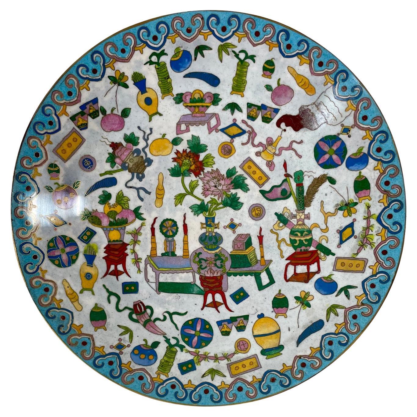 Large Chinese Qing Dynasty polychrome enamel bronze cloisonne charger.

Unusual and rare bronze Chinese Qing Dynasty Cloisonne charger. The brightly multicolored polychrome decoration features auspicious symbols, representing Chinese good luck and