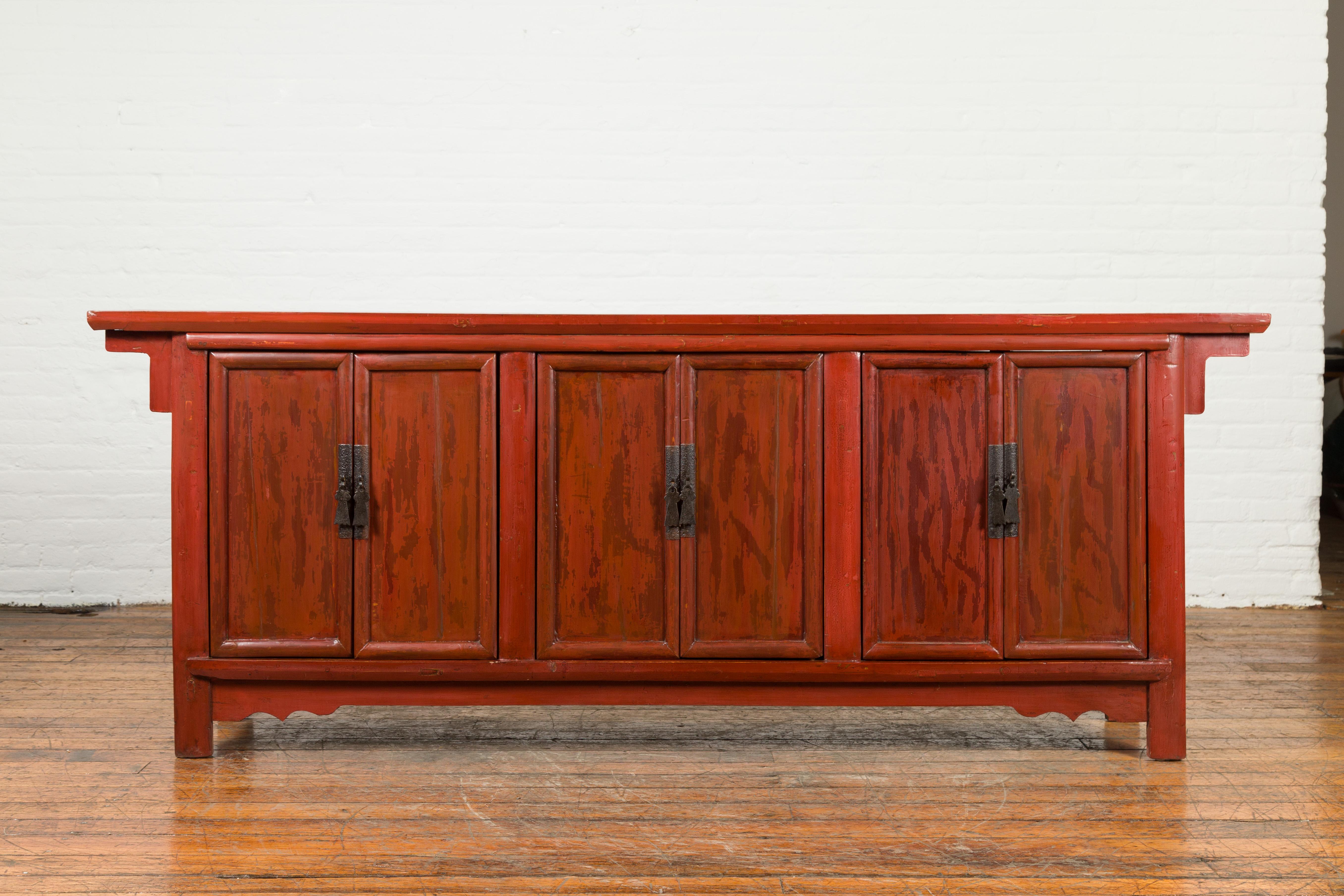 A Chinese 19th century Qing Dynasty period red lacquered elm sideboard from Shanxi, with three pairs of double doors. Created during the Qing Dynasty period, this sideboard comes from Shanxi, a north-eastern province of China, where it was made with