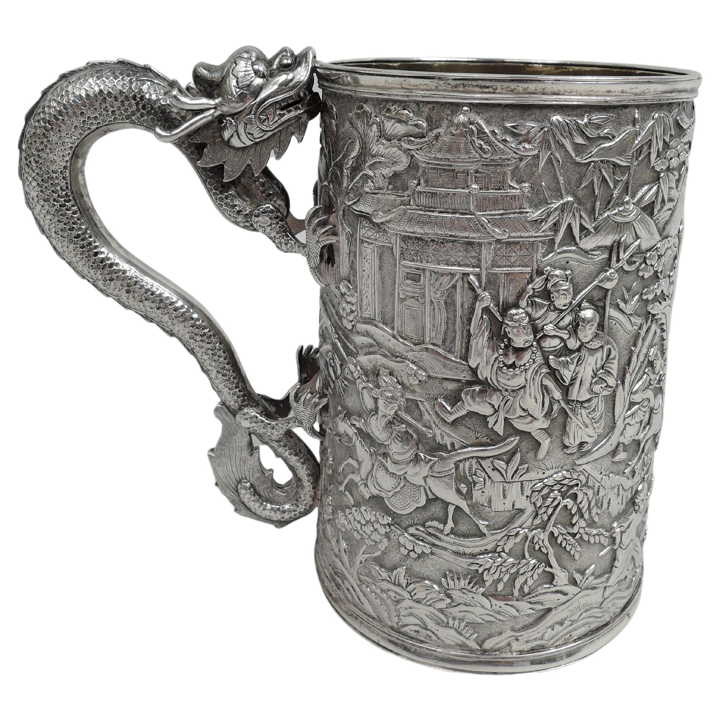 Large Chinese Silver Dragon-Handled Mug with Battle Scene