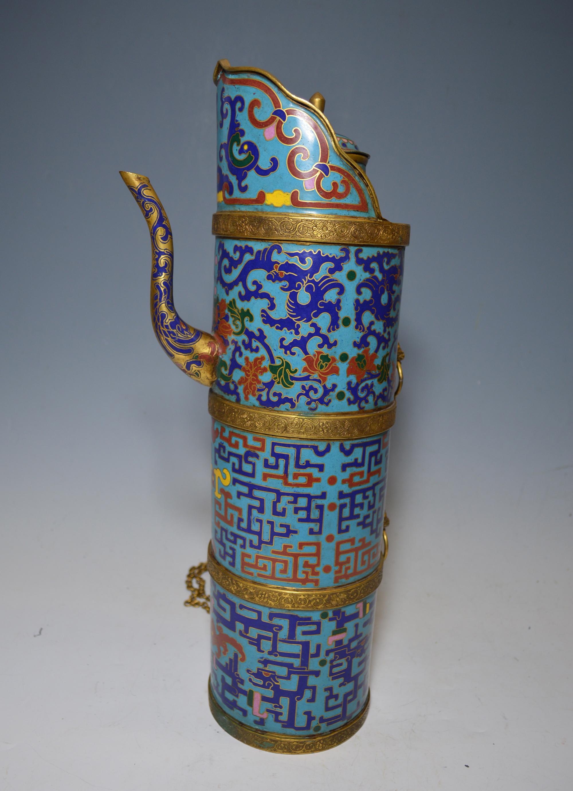 Superb large Chinese/Sino Tibetan cloisonné tea pot vessel
The long tall tea pot in bright enamel cloisonné with brass dragon head attachments
Decorated all-over with intricate embellished dragon floral and Buddhist motives
Brass with enamel with