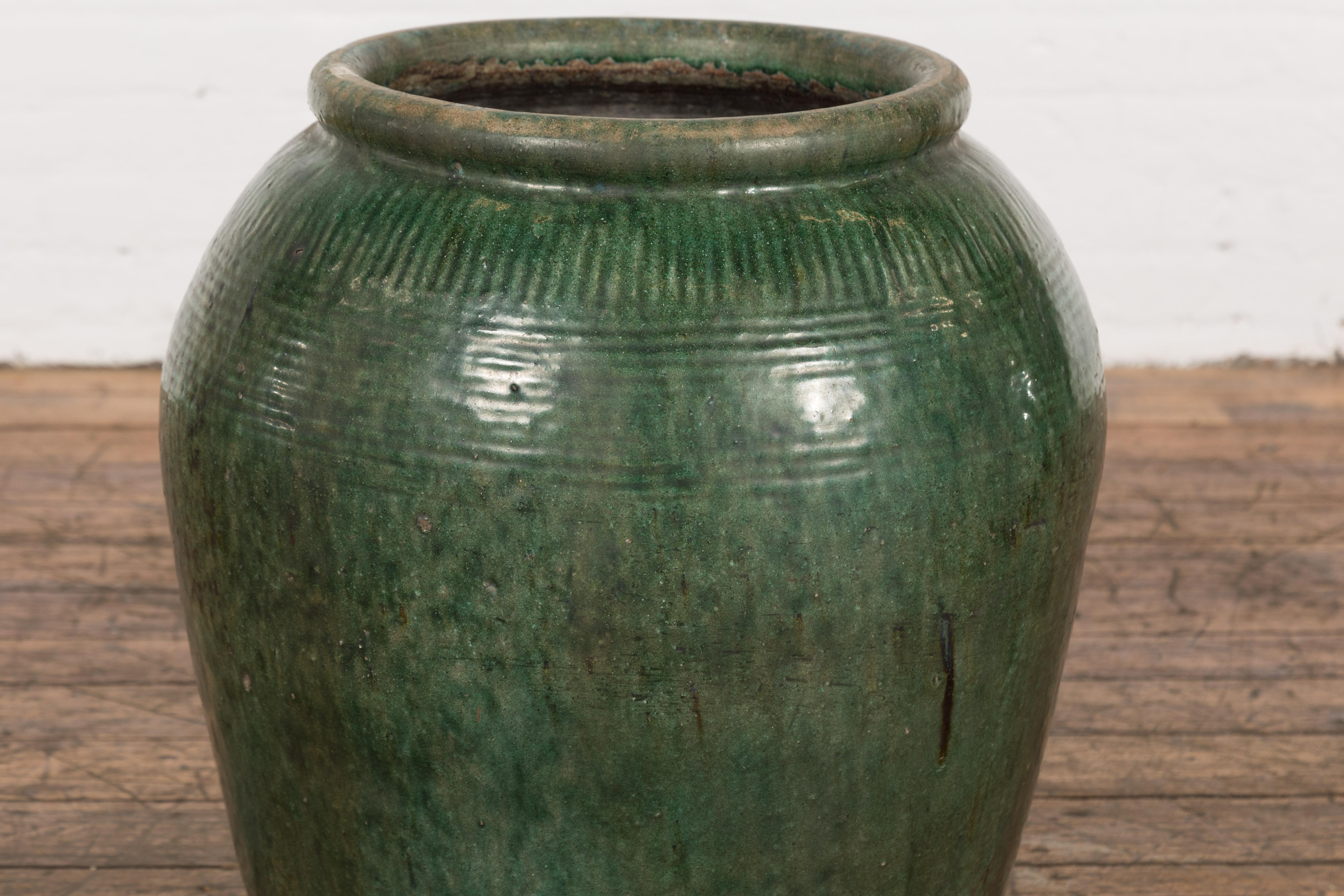 large green ceramic planter