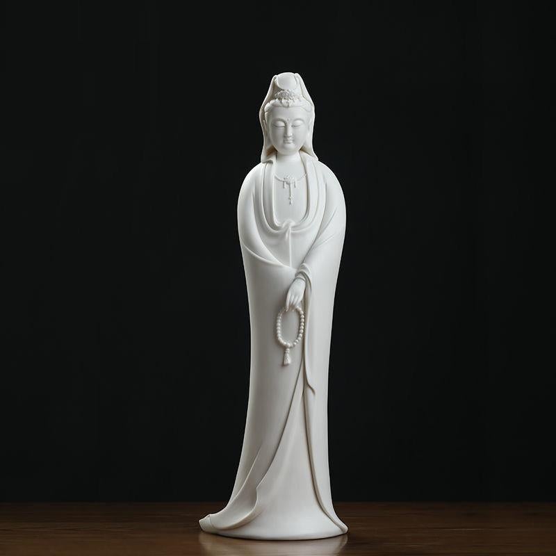 Estatua de Buda Guanyin de pie de porcelana blanca china vintage de 45 cm - Símbolo intemporal de compasión y serenidad

Añade gracia y profundidad espiritual a tu espacio con esta estatua de Buda Guanyin de pie de porcelana blanca china vintage de