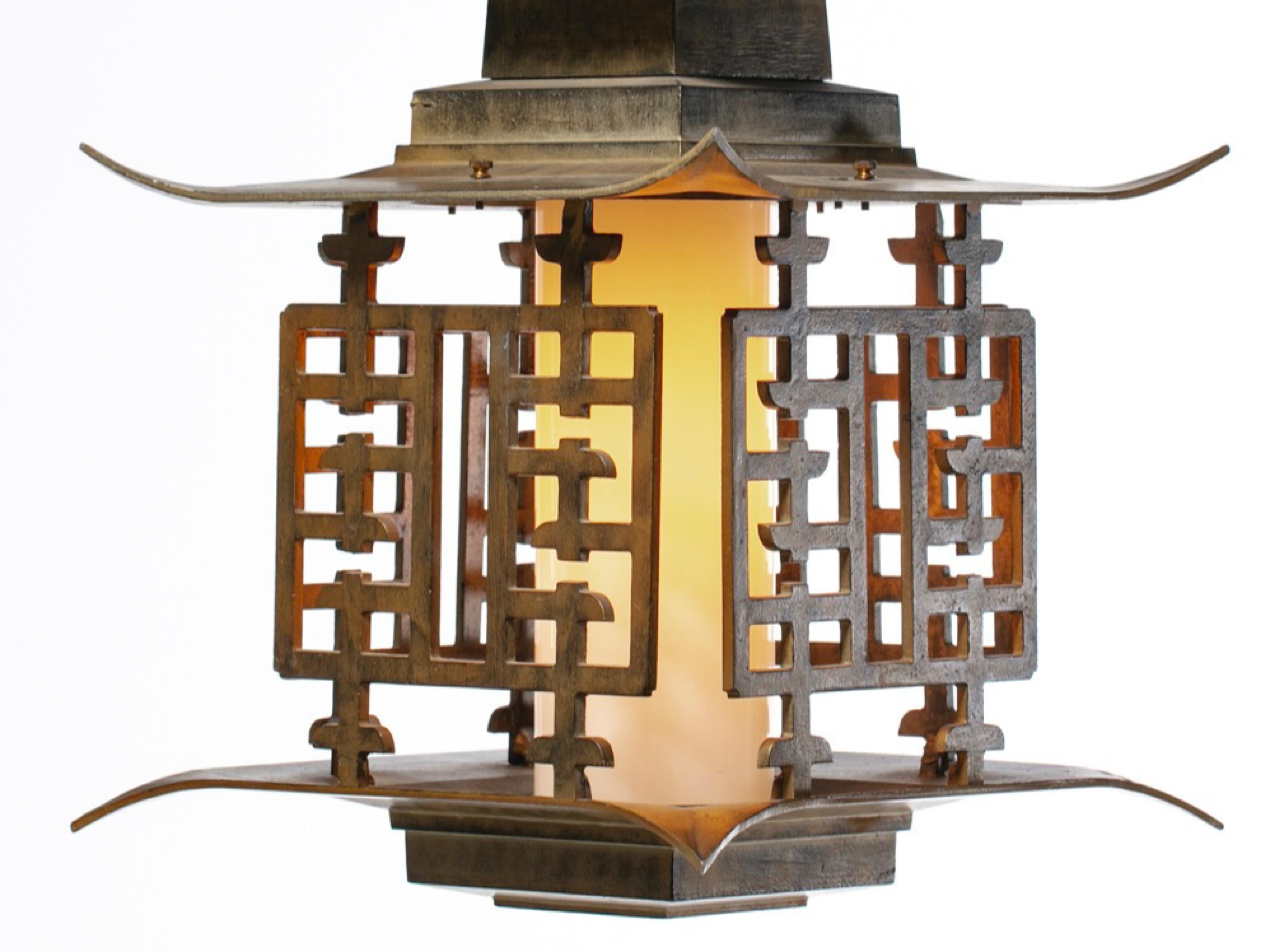 This large and majestic mid century pagoda lantern is of the sort aficionados and collectors of Chinoiserie mid century pieces scoop right up. The Asian lantern checks all the boxes. An authentic Mid Century light fixture sourced from the original