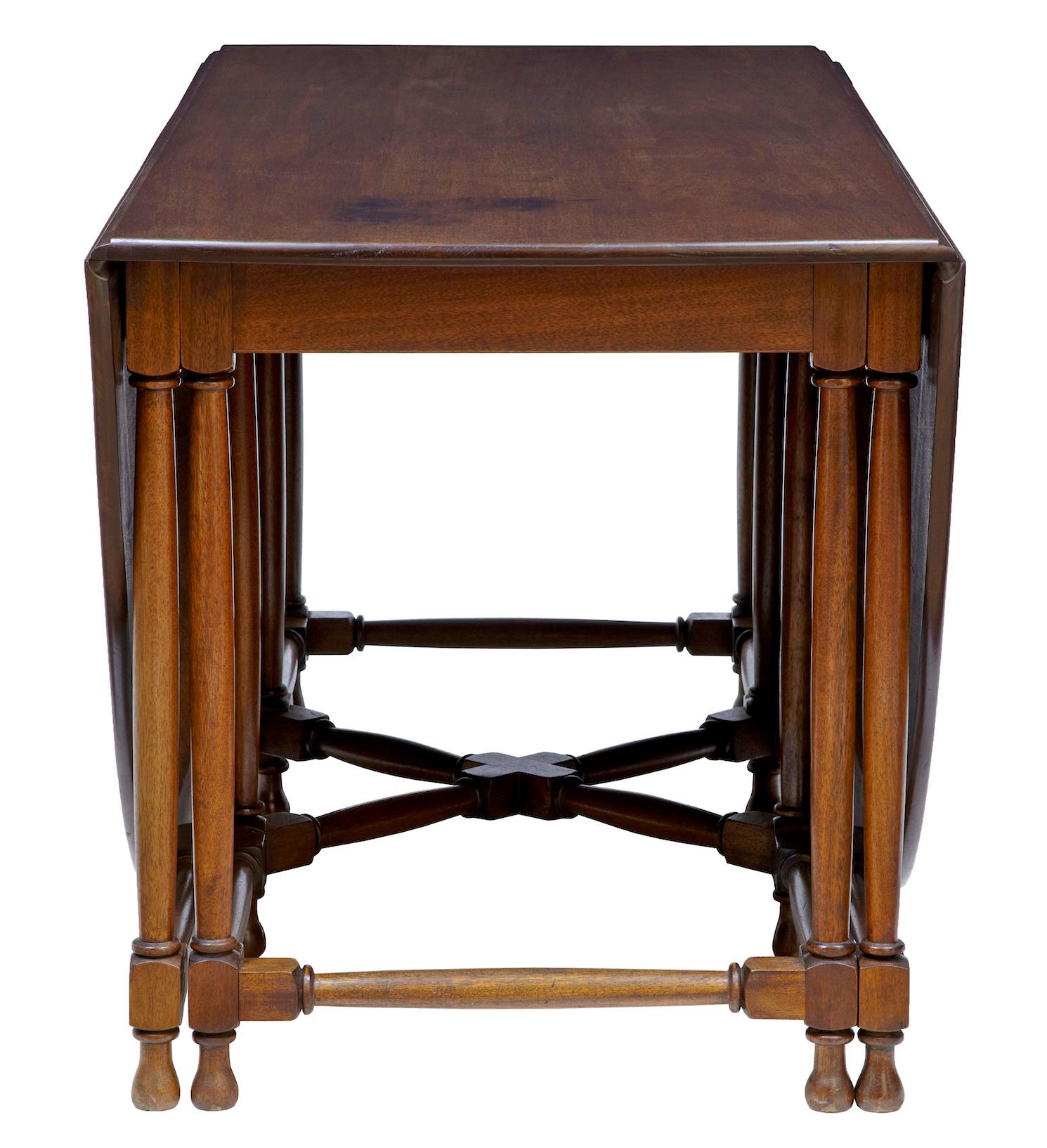 Here we have a gateleg table a little different from the normal with strong Chippendale influence to the base.

Drop down leaves open to provide seating for a good 10 people.

Made from good quality mahogany. Some surface staining to top, which