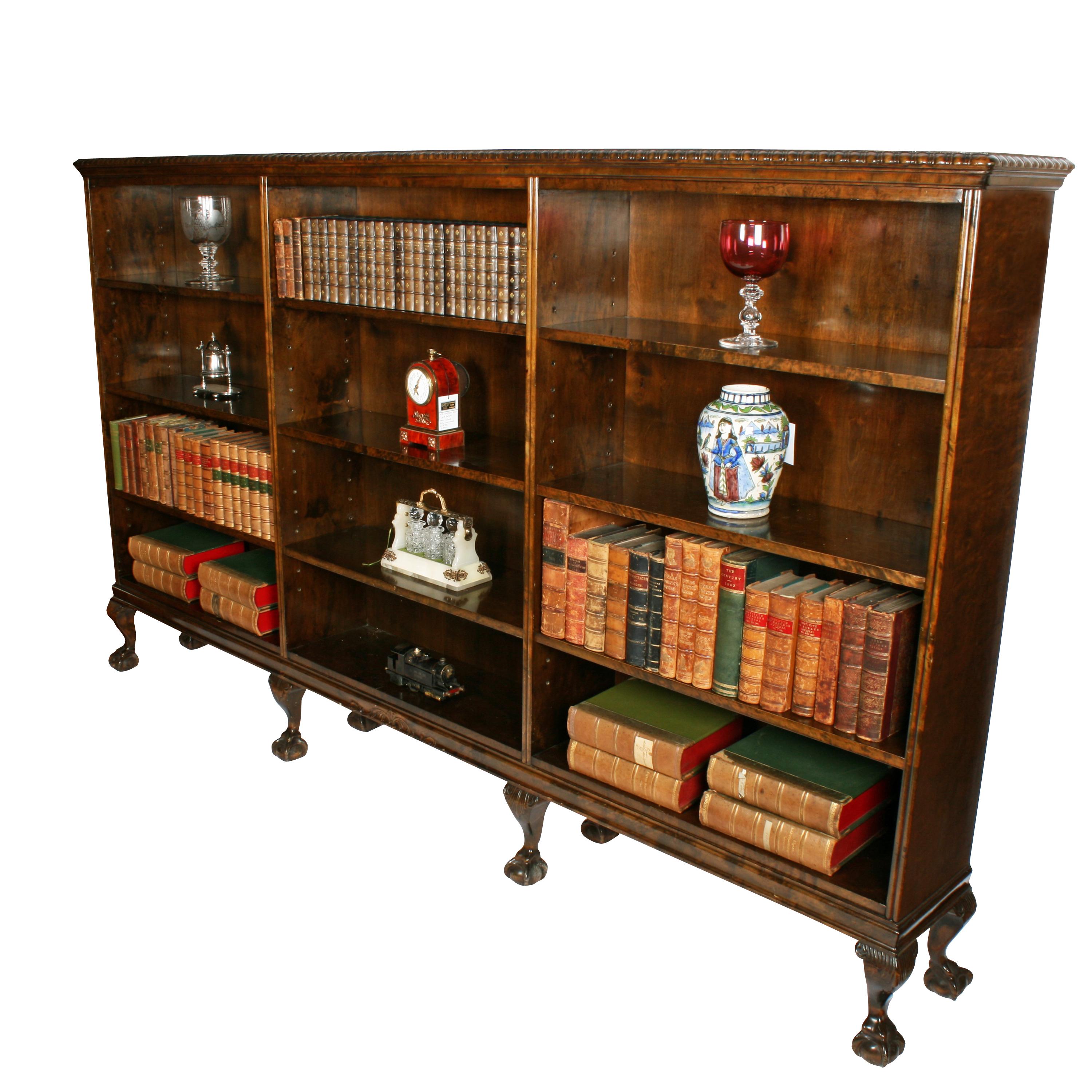 Large Chippendale style open bookcase

A large early 20th century mahogany Chippendale style open bookcase.

The bookcase has three sections each with three adjustable shelves.

The bookcase has a gadrooned carved edge to the top, a carved