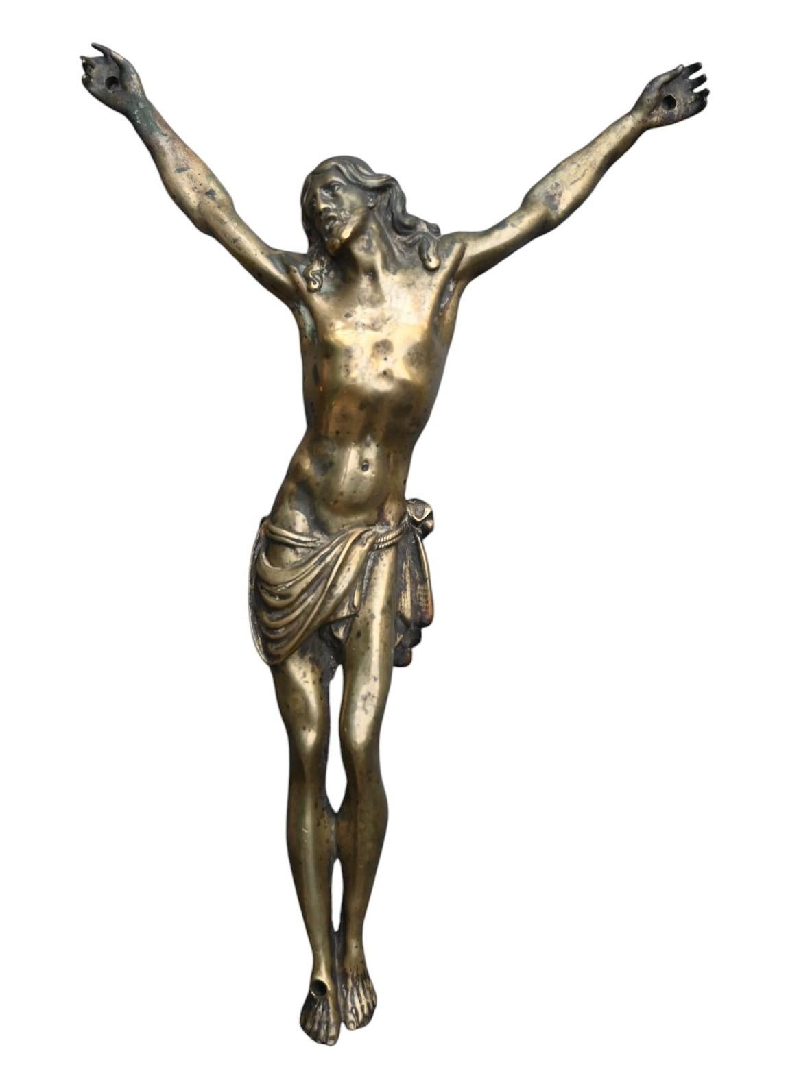 A large 17th century bronze corpus, finely detailed
Height from head to feet 24.5 cm, width from hand to hand 18.5 cm
Total height 28 cm
Good condition with aged patina