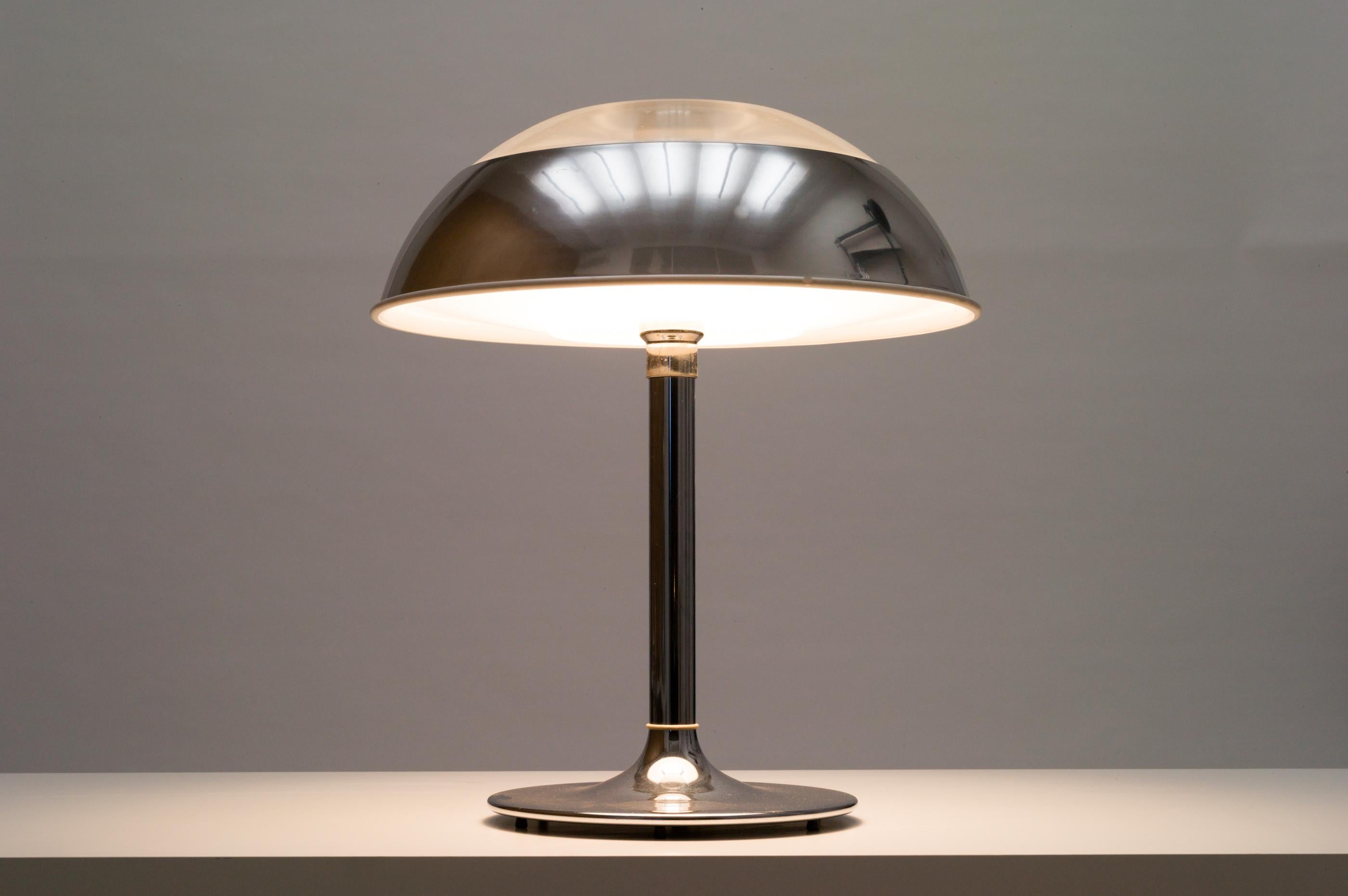 Large Space Age table lamp produced by Fagerhults in the 1970s. Base made of chromed metal and shade of chromed metal / acrylic.