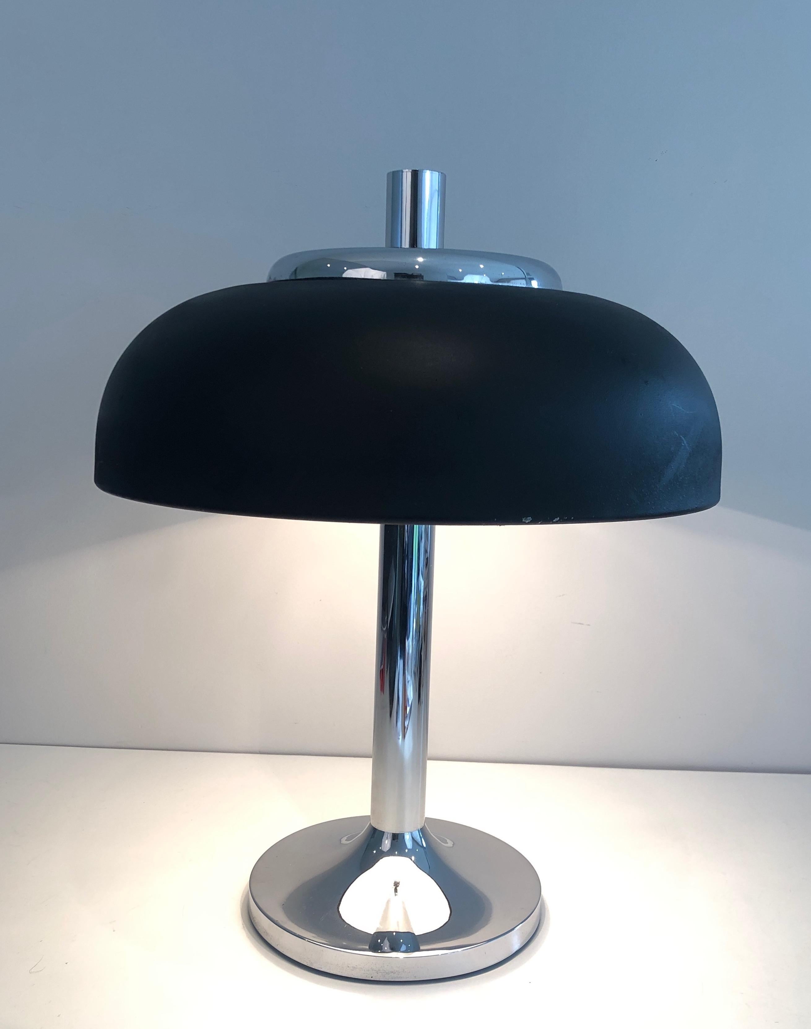 This large design table lamp is made of chrome and black lacquered. This is a French work of very nice quality. circa 1950.