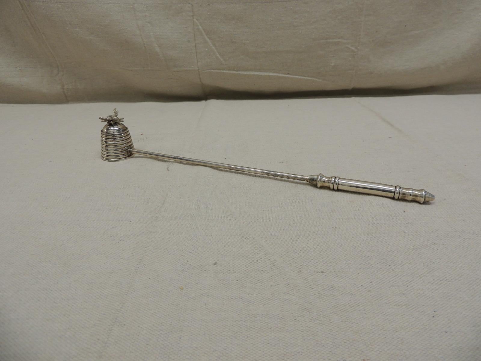 Large chrome candle snuffer
with a bee and beehive style cup
Size: 