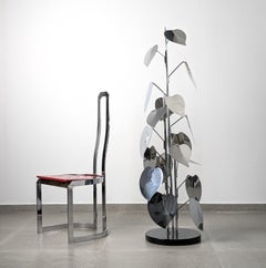 Gran escultura de suelo de hoja cromada sobre base circular, años 70