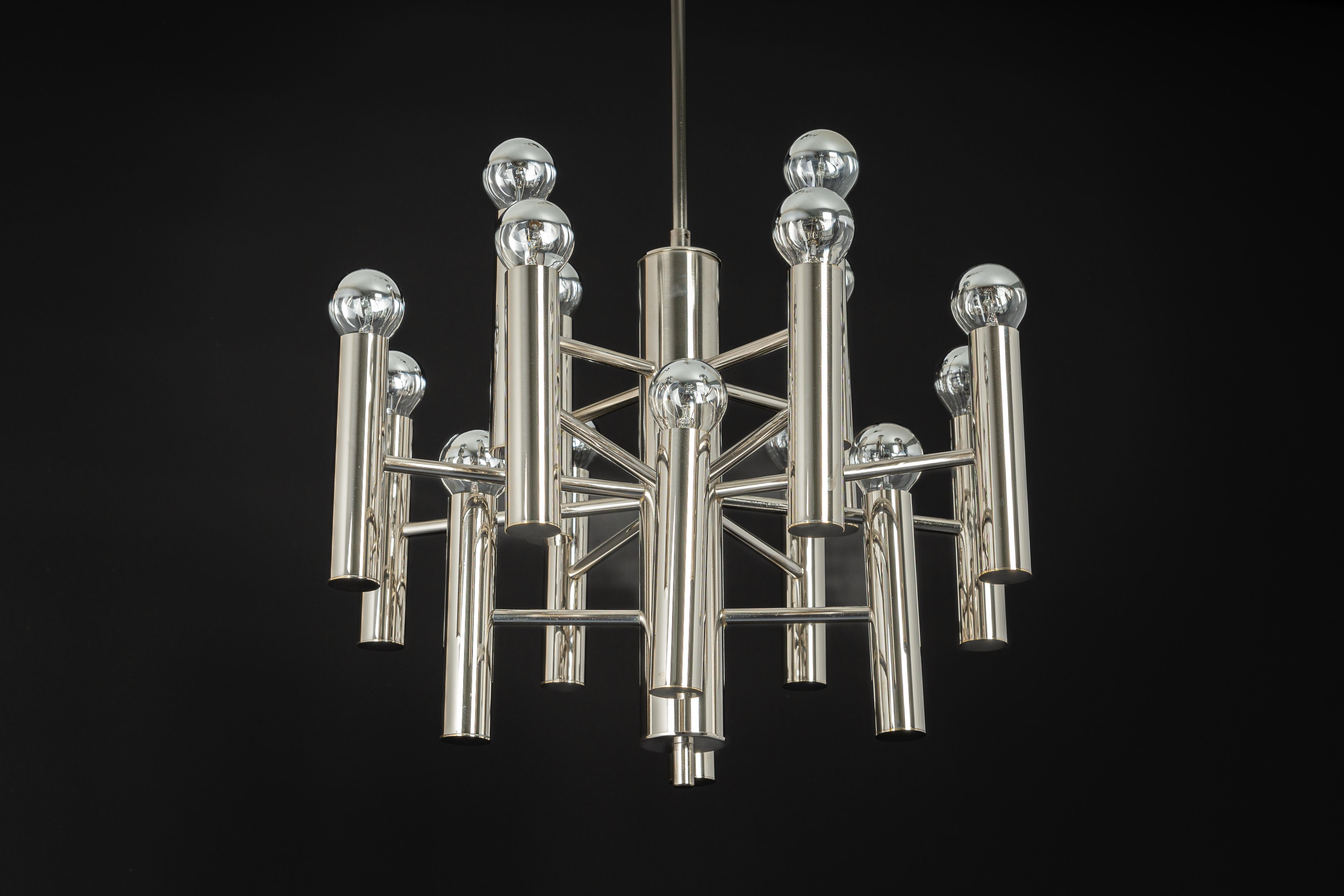 Stunning Sputnik chandelier designed in the manner of Cosack during the 1970s.
Nice Space Age design.

Sockets: It needs 16x E14 small bulbs.
Light bulbs are not included. It is possible to install this fixture in all countries (US, UK, Europe,