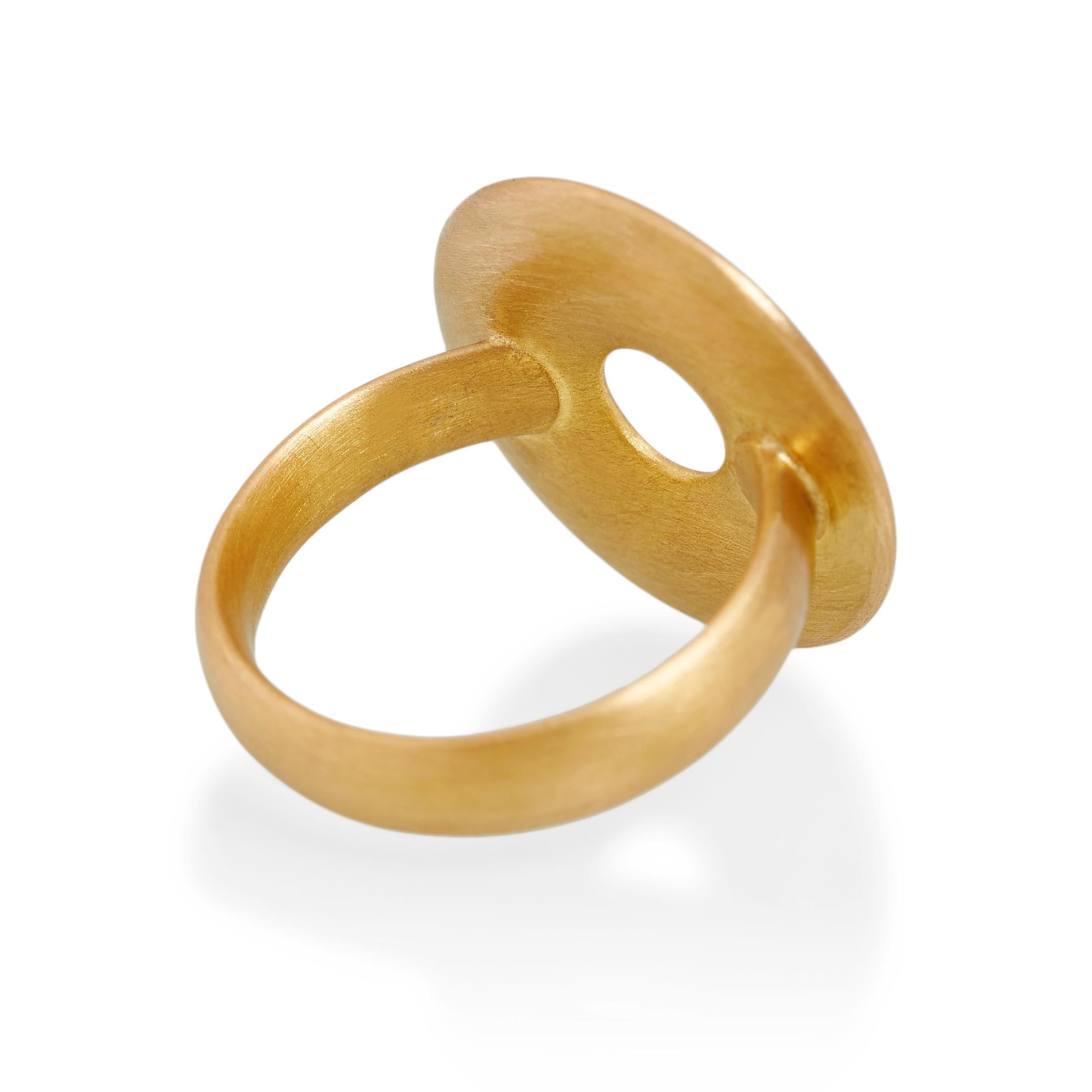 Hand carved large circle ring in solid 22ct gold. Strong contemporary design and a unique take on signet ring. 
ref: S17003

20mm circle diameter  
22ct gold

Cadby & Co are a family business that specialise in reusing & up cycling old cut diamonds