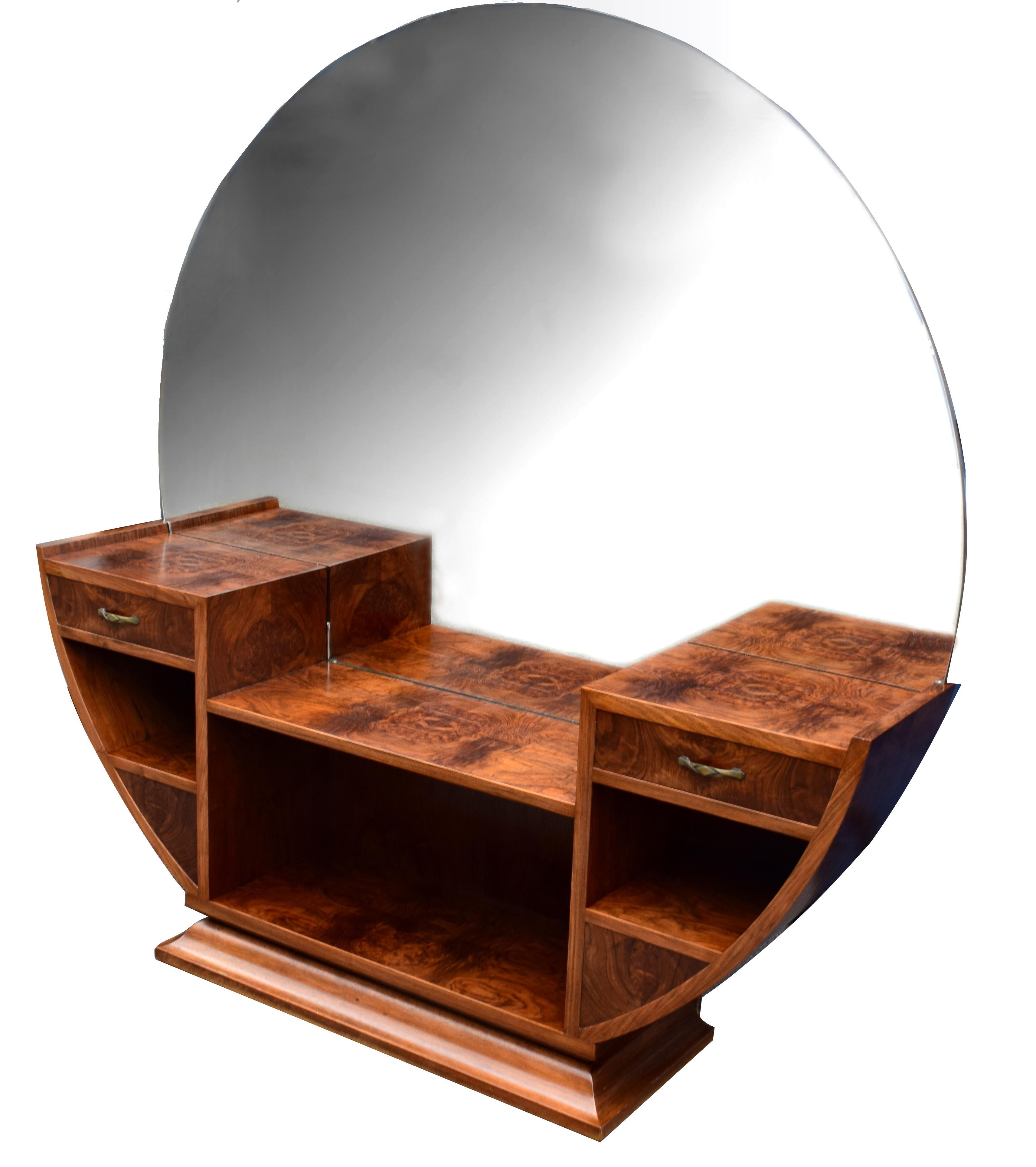 Wonderful high quality 1930's Art Deco dressing table originating from England. This very glamorous dressing table really is a superb piece of furniture in both it's styling and craftsmanship. Features a huge mirror which is one of the largest we've