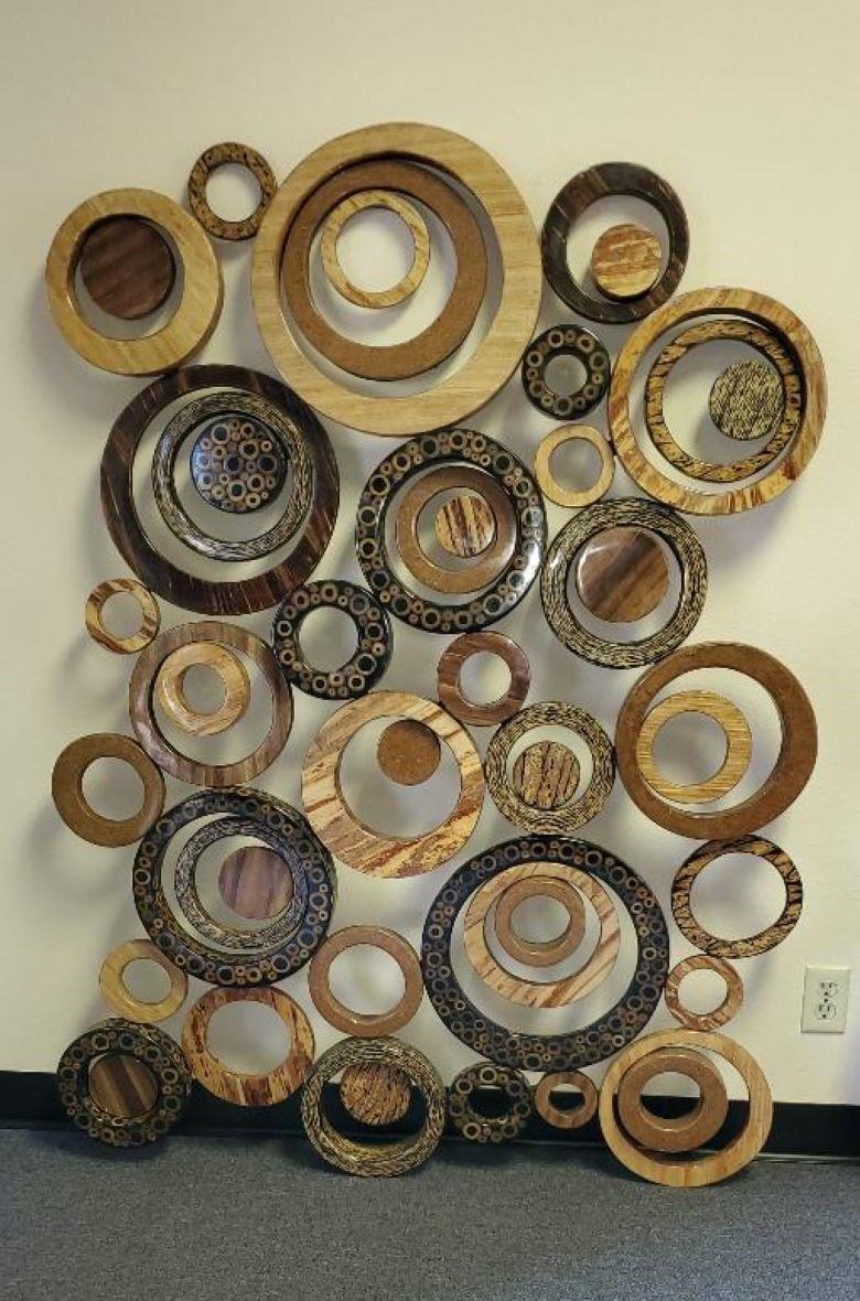 Gorgeous Large Circular Wall Sculpture Collage For Marquis Collection of Beverly Hills.
The Large Circular Pieces Are Made With Natural Stone, Dark Banana Bark, Cracked Bamboo, Corn Stalks And Fern Tassels Finished In A Natural Coating. As You See
