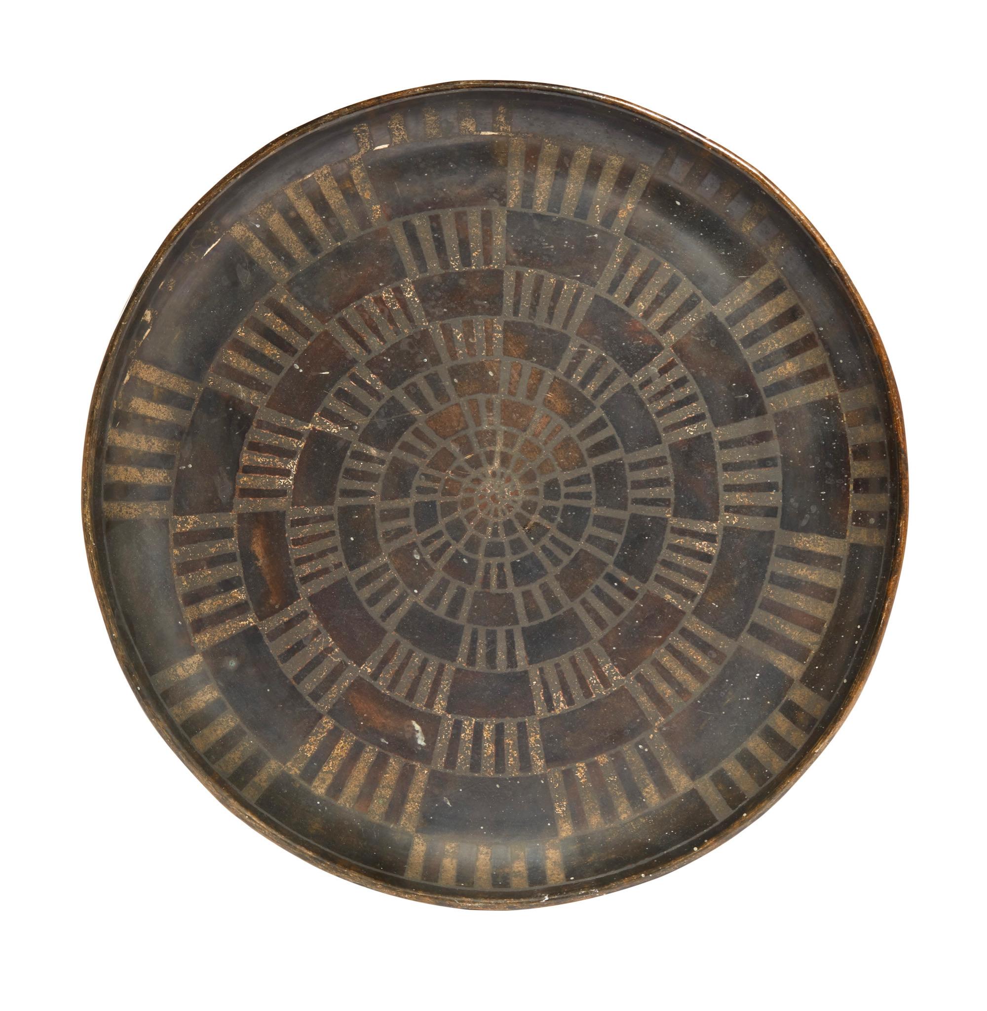 In copperware patinated with a geometrical oxidized pattern. Signed.
Origin
Hélène Bukanowski's collection ; transmitted by heredity to the previous owner.