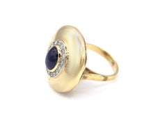 Large Circular Sapphire Cabochon Yellow Gold Ring