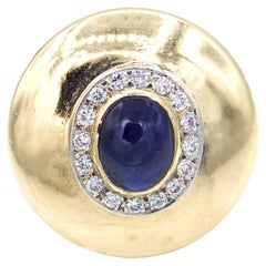 Large Circular Sapphire Cabochon Yellow Gold Ring