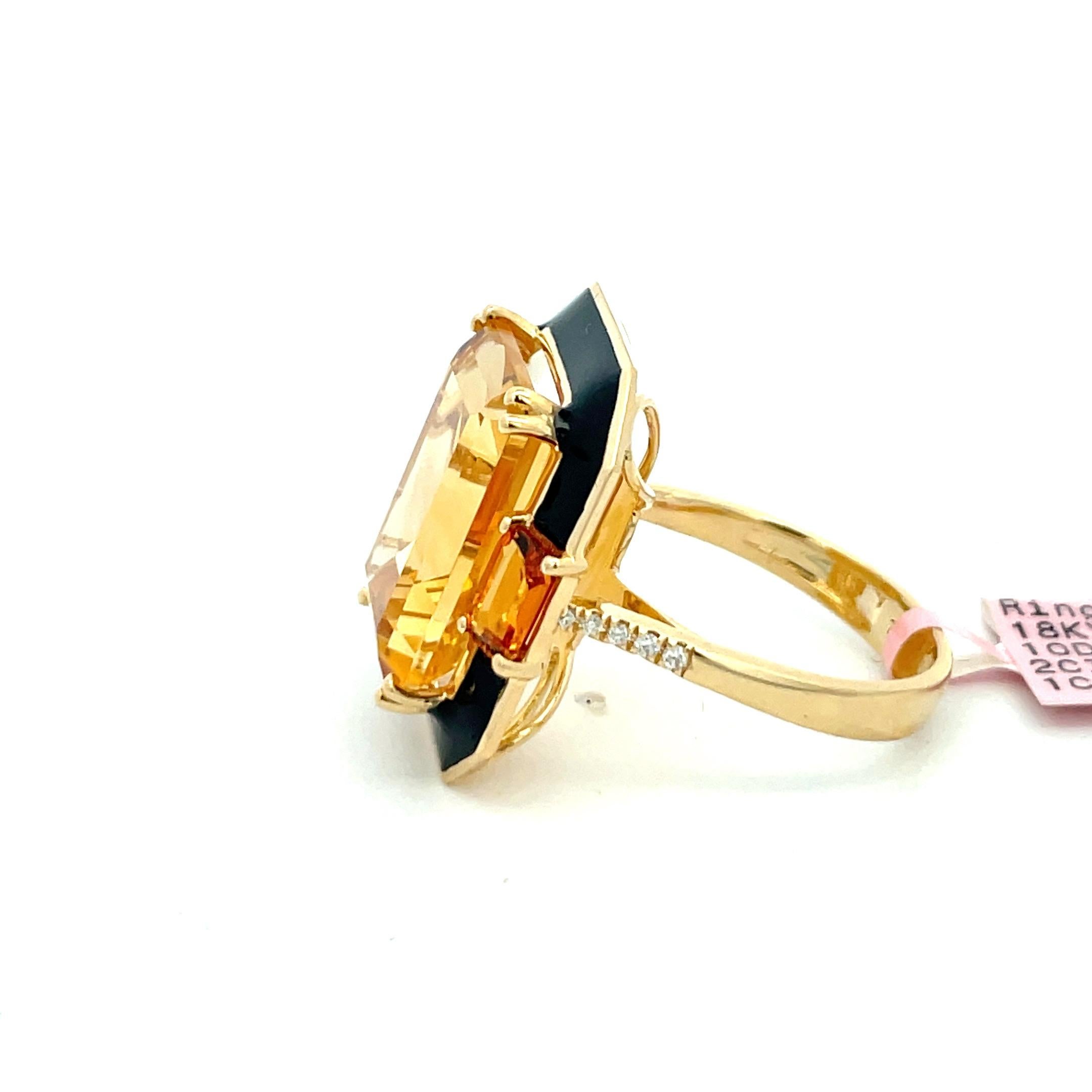 One large cocktail ring, featuring a center citrine weighing 11.50 carrots flying to it too small as citrines weighing 1.28 carats surrounded by black enamel. On the mounting there are 10 diamonds weighing 0.06 carats. 
Citrine 16 MM * 12
Ring
22.2
