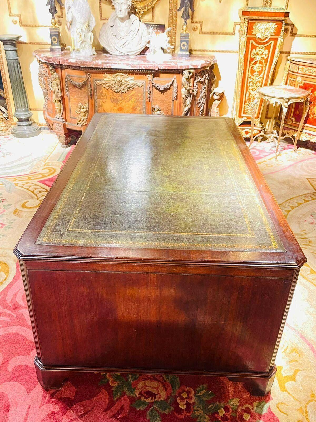 Body made of solid wood and stained mahogany. Leather covered worktop. Freely adjustable in every room. Desk consists of three parts (2 containers + worktop). The desk is an absolute classic and fits in every household / office. It also offers