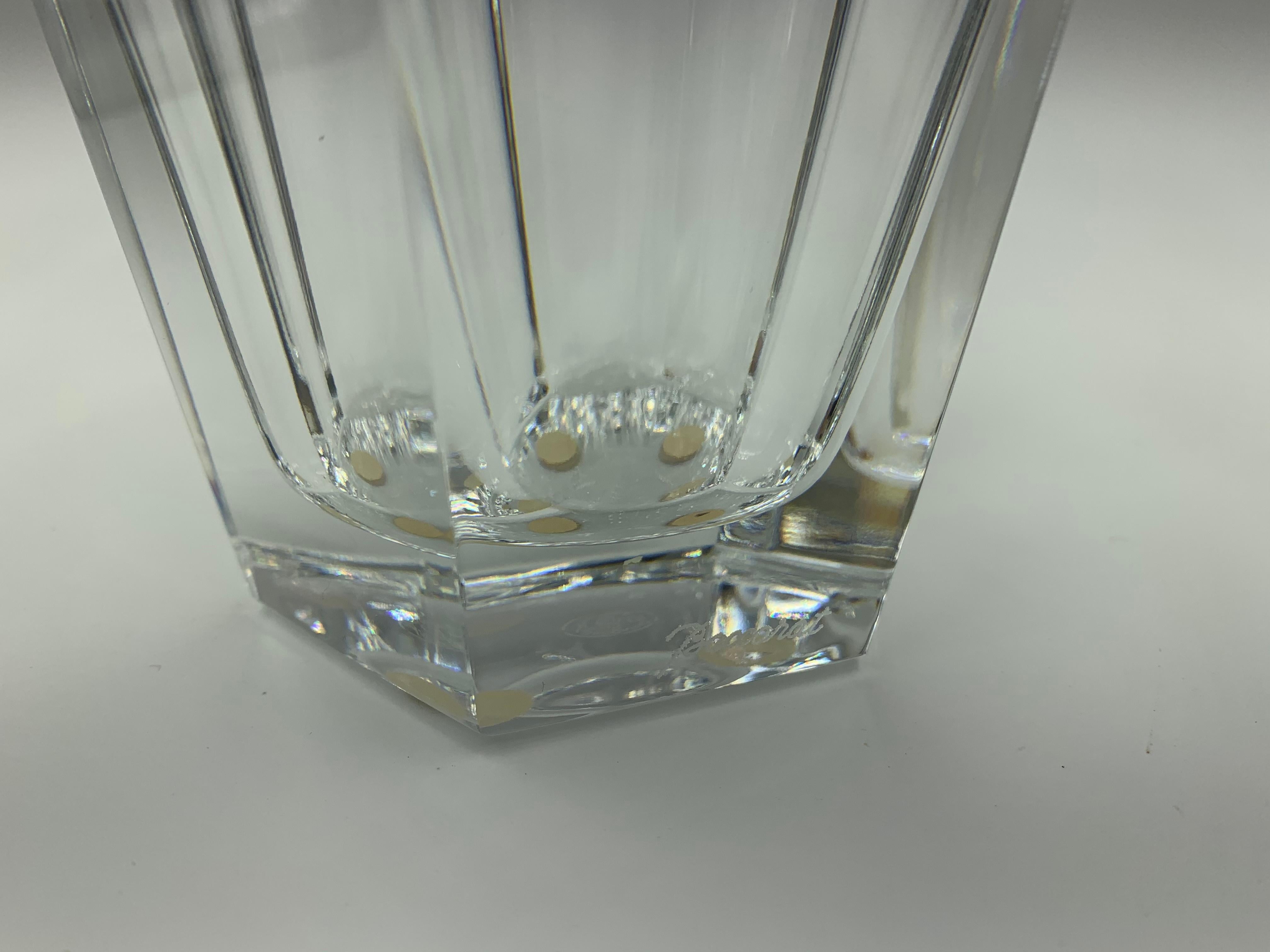 One of Baccarat's classic designs and no longer available at Baccarat except by special order, this largest of the Nelly vase line is perfect for roses, peonies and orchids. Excellent condition, signed on base with the Baccarat circle mark and laser