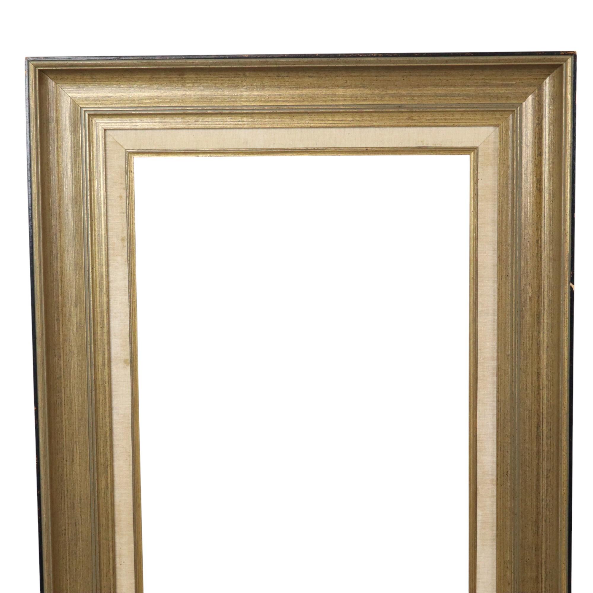 Large, gilded vintage pine frame with a beautiful patina of age. The sides are black lacquered. Completely in classic style, XL size, simple and sleek frame, circa mid-20th century.

A nice size frame for creative expression, great as a mirror, to
