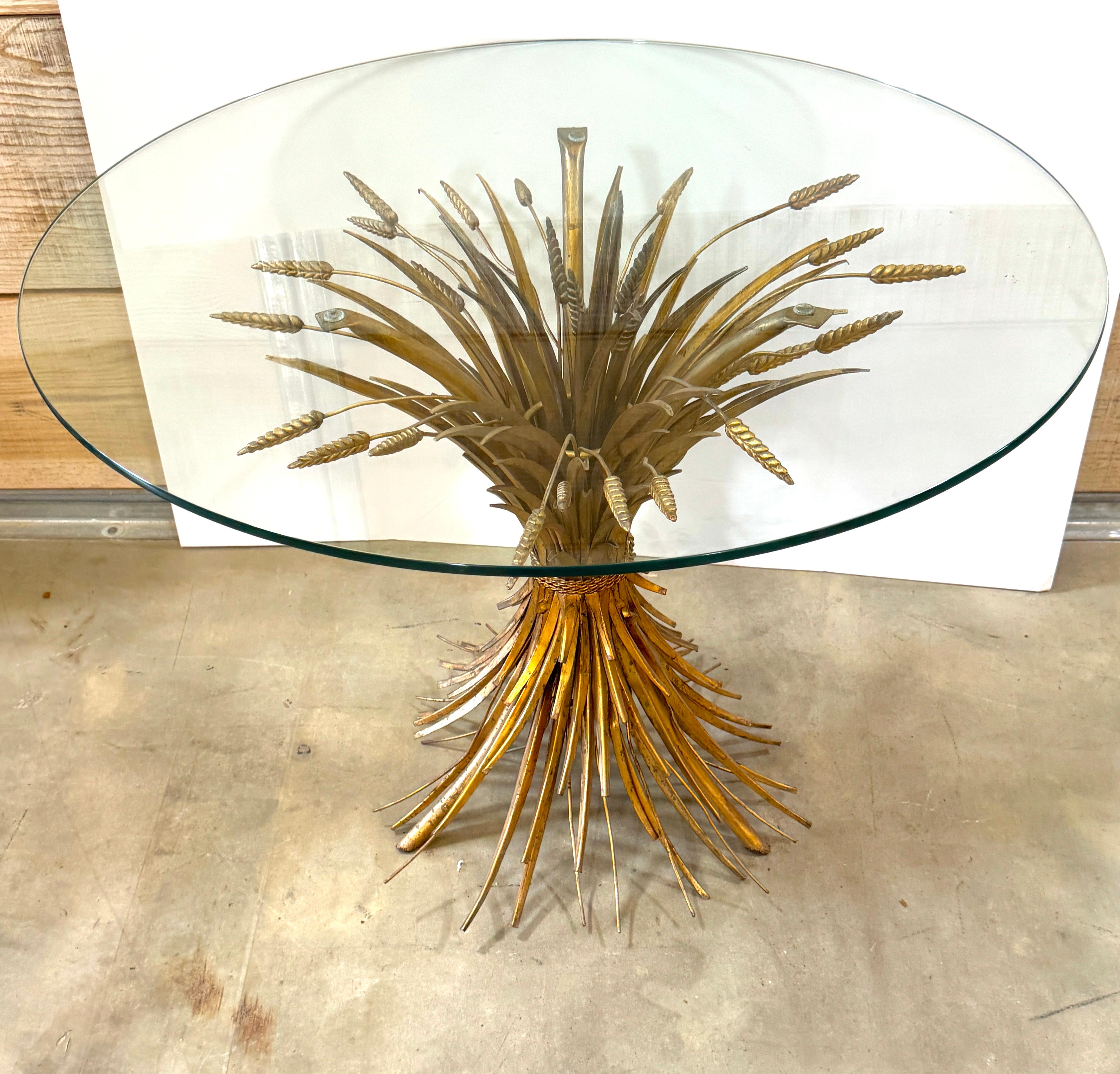 Large Classic Italian Gilt “Sheaf of Wheat” Table—As Seen in Coco Chanel’s Apartment Italy, circa 1950s

A rare and striking large-scale gilt-metal “Sheaf of Wheat” table, Italian circa 1950s, in the style popularized by Maison Jansen and famously