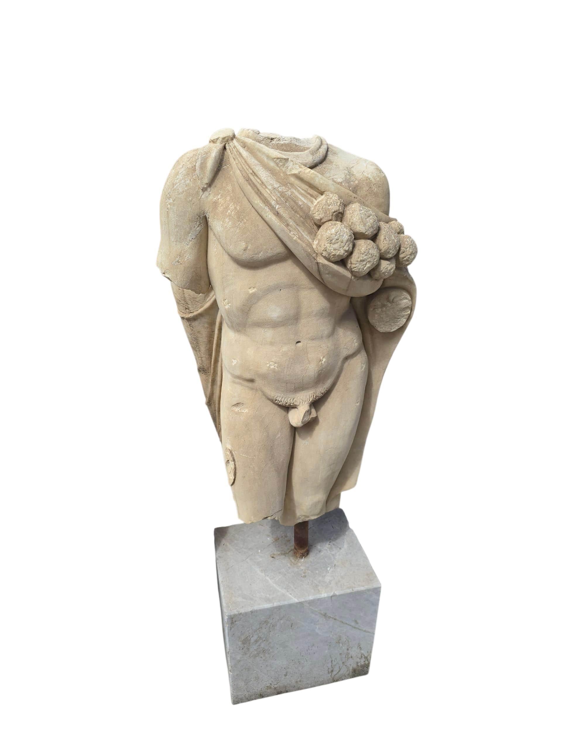 Impressive classical marble torso of Hercules, carved in Italy during the first half of the 20th century. The sculpture emphasizes the heroic anatomy and powerful presence of the mythological figure, reflecting the aesthetic of ancient Roman