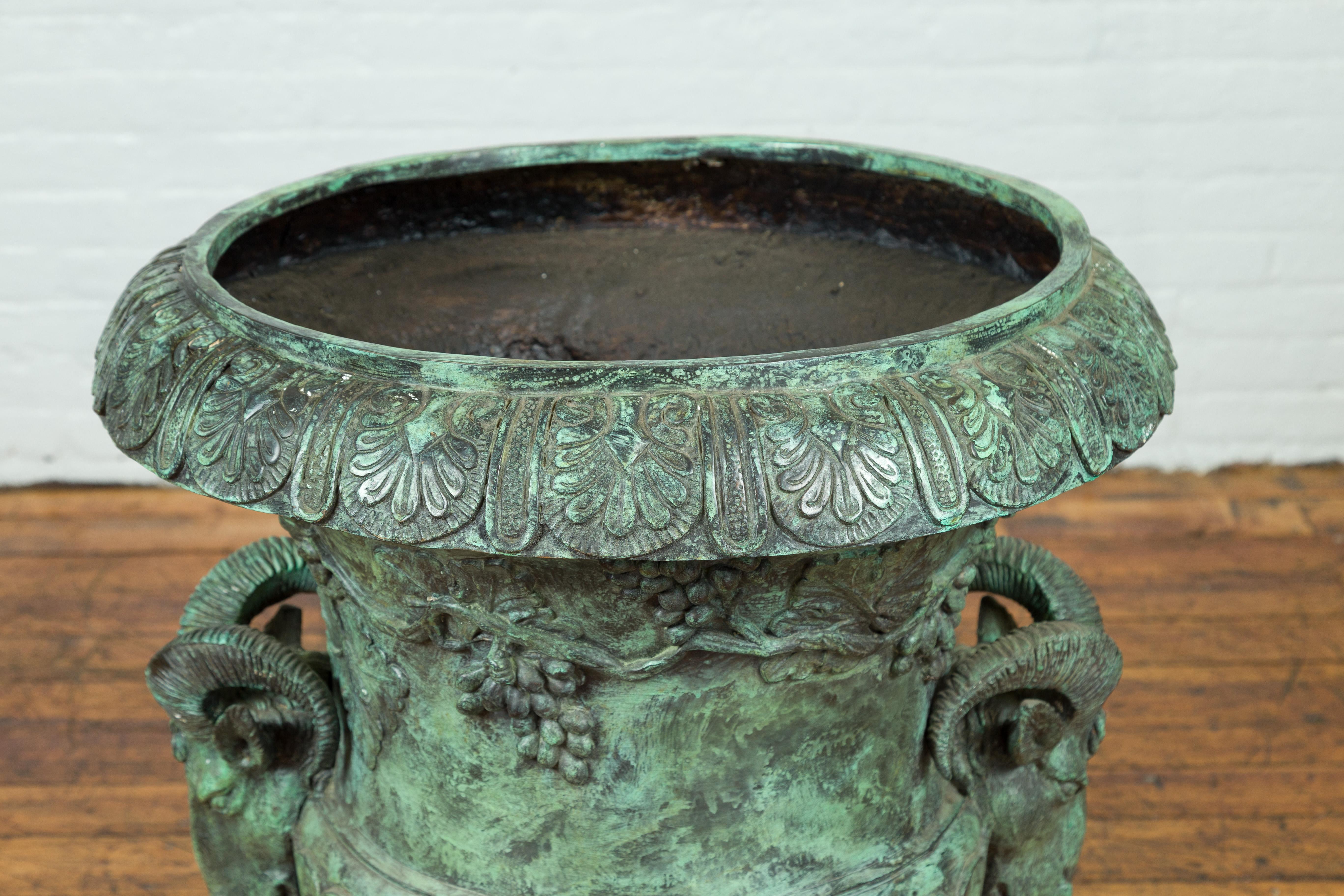 Cast Large Classical Roman Style Bronze Urn Planter with Verde Patina and Rams Heads For Sale