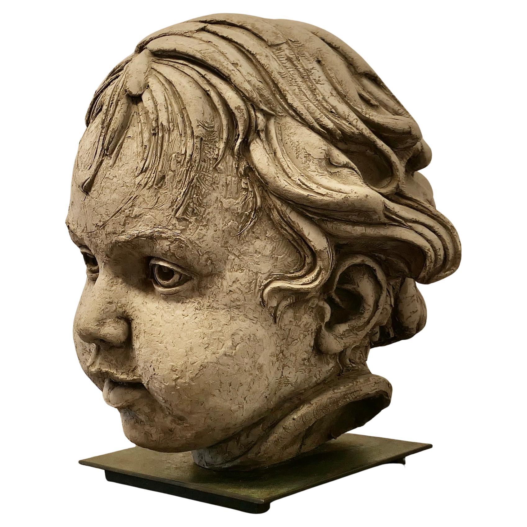 Large Clay Bust of a Child by Philippe Seené, 2004 set on Bronze     Life size s For Sale