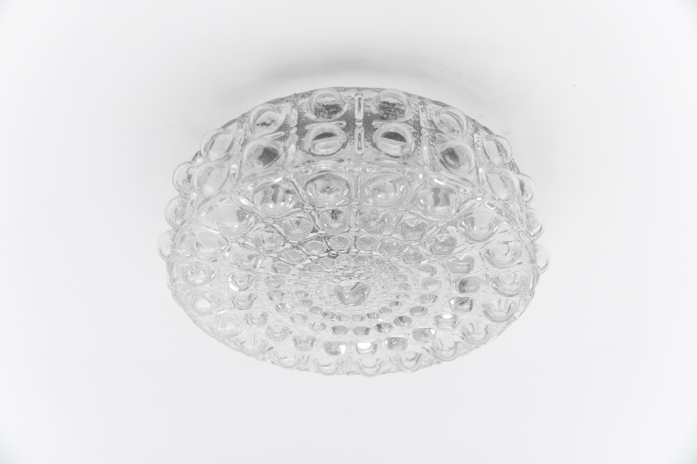 Large Clear Bubble Glass Wall Lamp or Flush Mount by Helena Tynell, 1960s Limburg

The fixture need 1 x E27 standard bulb with 60W max.

Light bulbs are not included. 

It is possible to install this fixture in all countries (US, Australia, Asia,