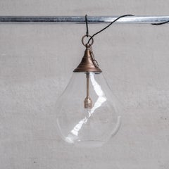 Large Clear Glass and Brass Bulb Shaped Pendant Light