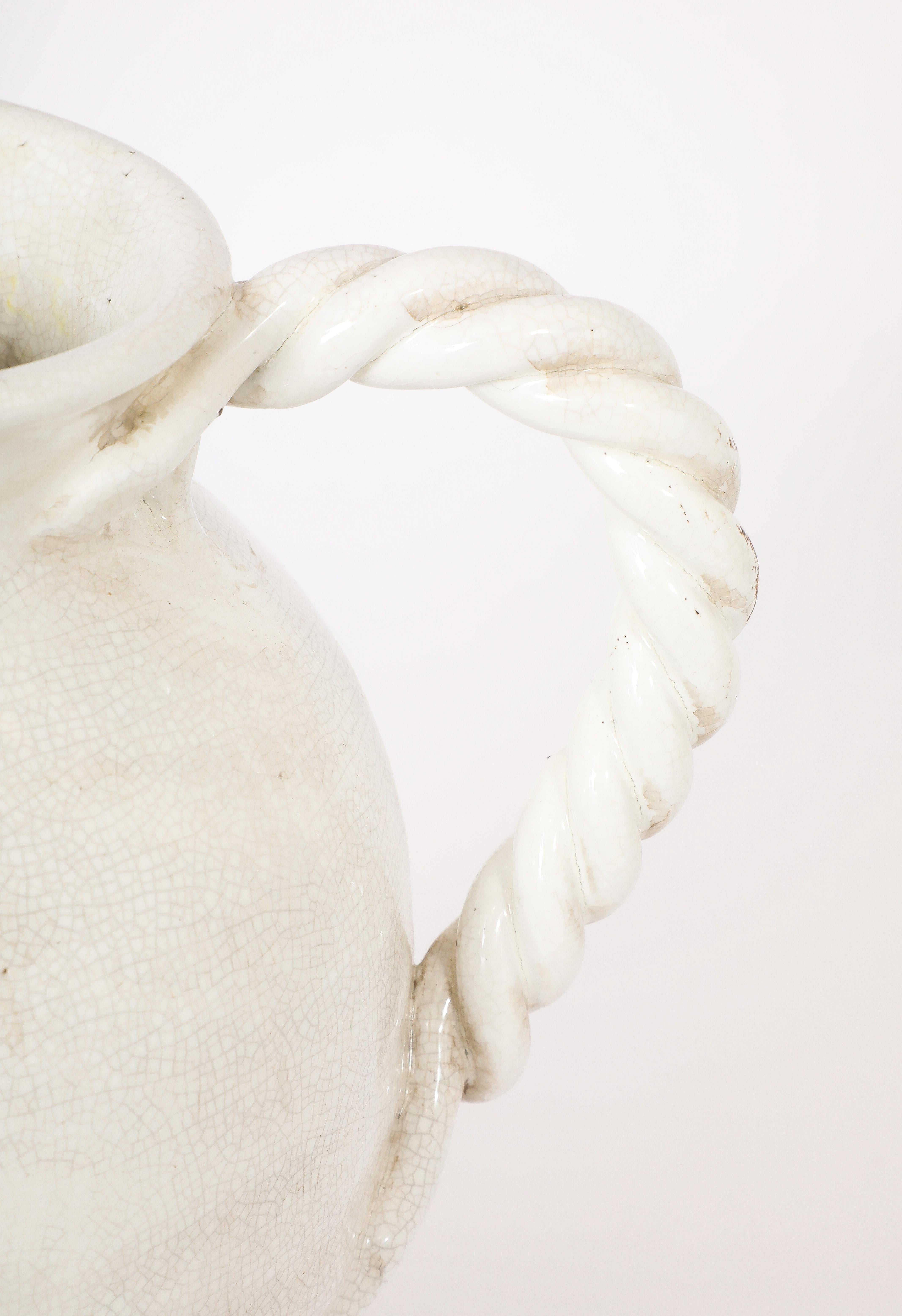 Crackled white ceramic pitcher with a rope handle
