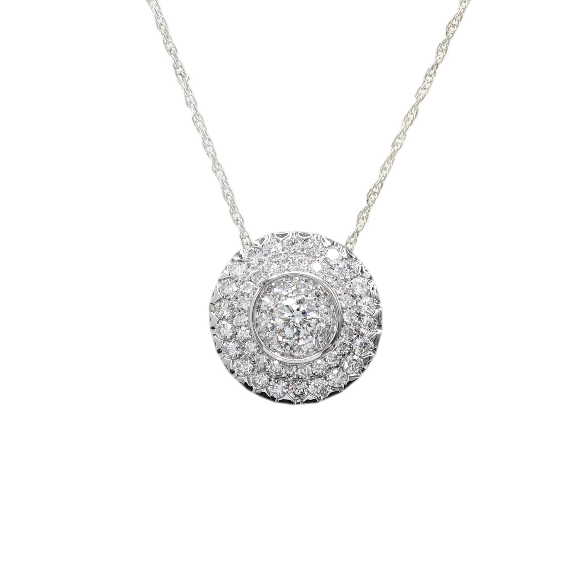 Super Cluster Layout of Brilliant Diamonds, This special craftsmanship makes the diamonds visible to the eye as one large diamond, must see it to believe it ! Pendant diameter size approx 15 mm (1/2' a inch)  18k white gold 6.40 grams.
Total