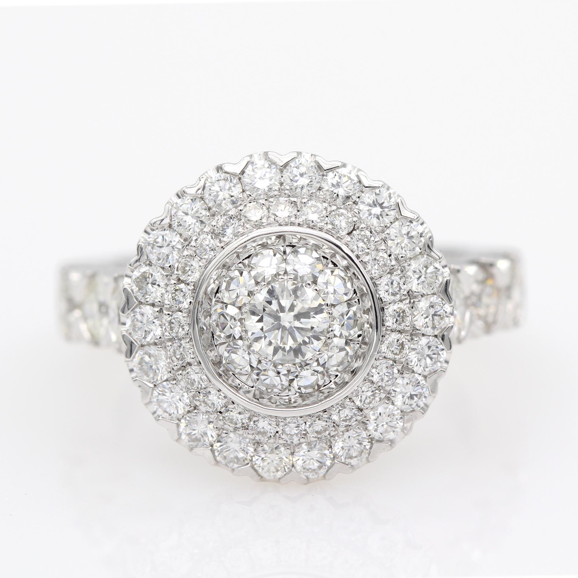 Super Cluster Layout of Brilliant Diamonds, This special craftsmanship makes the diamonds visible to the eye as one large diamond, must see it to believe it ! Diamond area diameter size approx 20 mm,  or 5/8 of a inch.  18k white gold 9.75