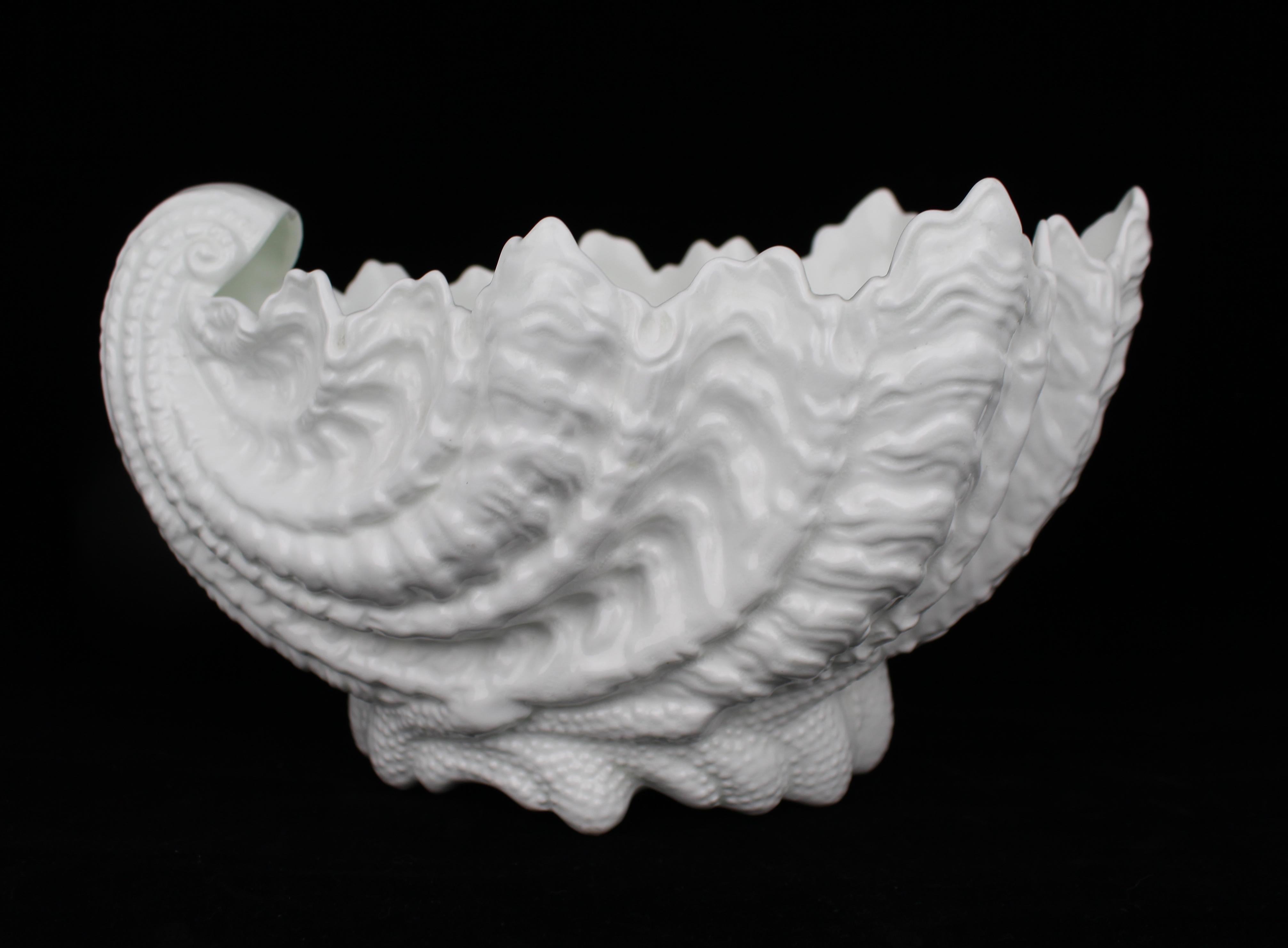 Large Coalport Shell Form Porcelain Sweet Dish, England, circa 1890

A sculptural late Victorian porcelain sweet dish by Coalport, finely modelled in the form of a stylised shell. The piece is richly detailed with deeply ruffled edges and coiled,