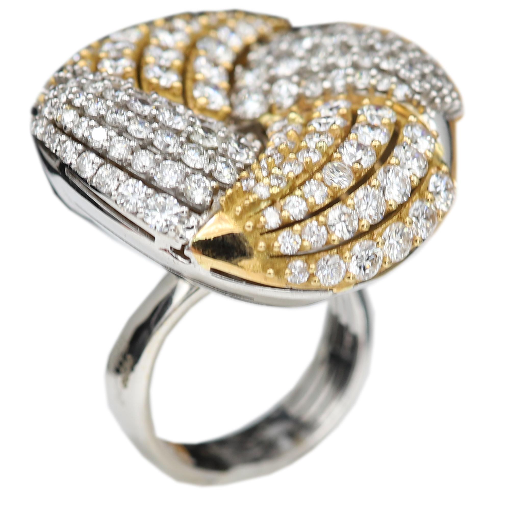 Bold, Large and very Statement Ring.
18k White & Yellow Gold 16 grams.
Total Diamonds 5.22 carat G-VS.
Finger size 7
Design Size- approx 30 Diameter.
