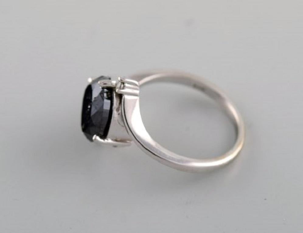 Oval Cut Large Cocktail Ring in 14 Carat White Gold with Oval Facet Cut Black Diamond For Sale