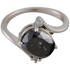 Large Cocktail Ring in 14 Carat White Gold with Oval Facet Cut Black Diamond