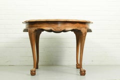 Large coffee table in Baroque style, mid century, with claw foot legs, burl wood