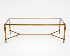Large coffee table made of hammered and gilded iron, by Robert Thibier, 1960