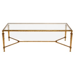 Large coffee table made of hammered and gilded iron, by Robert Thibier, 1960