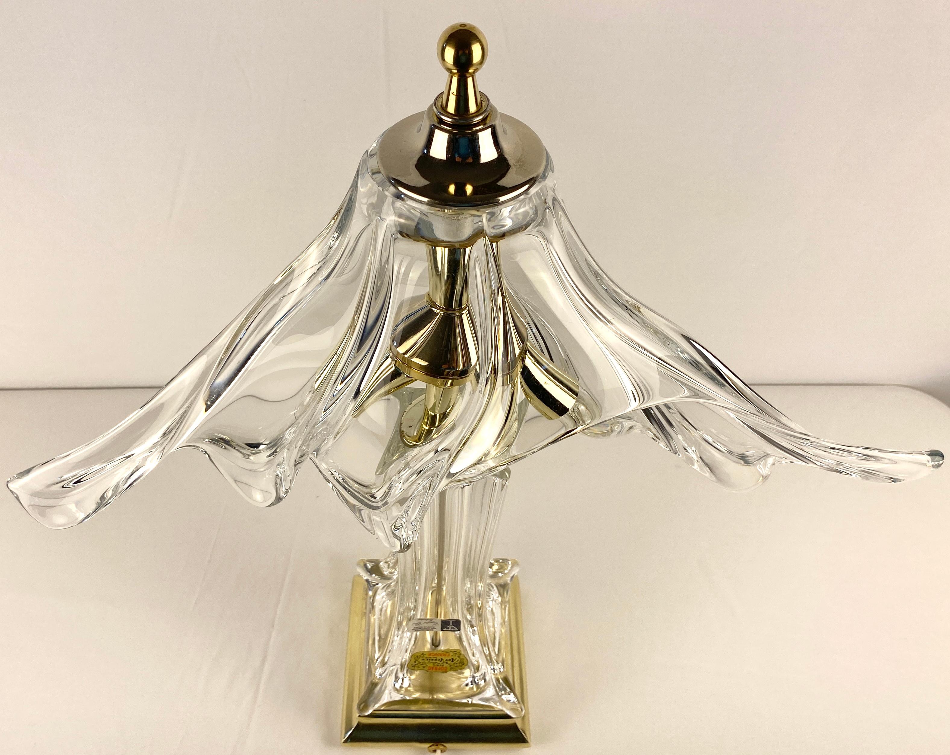 A beautiful and very good quality Art Deco style table lamp in uniquely shaped blown crystal and brass. Cofrac Art Verrier from France. This piece bears the makers mark. Cofrac used labels to identify their pieces which were usually removed by the