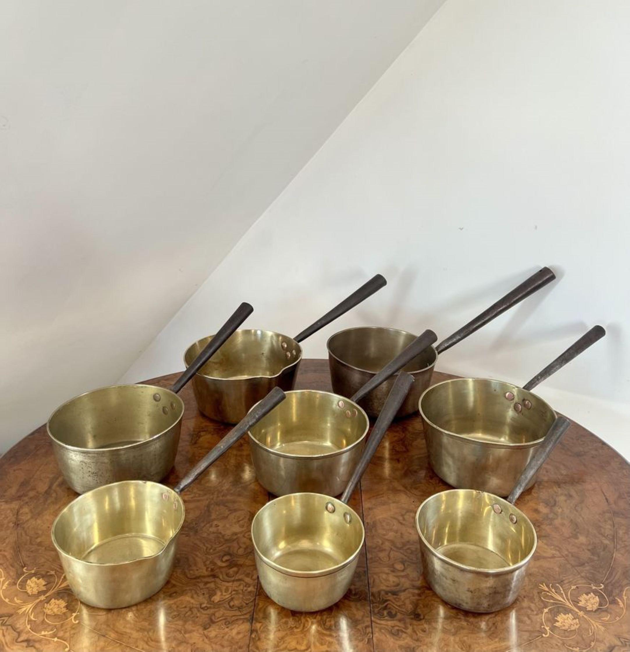 Brass Large collection of antique Victorian heavy brass saucepans  For Sale