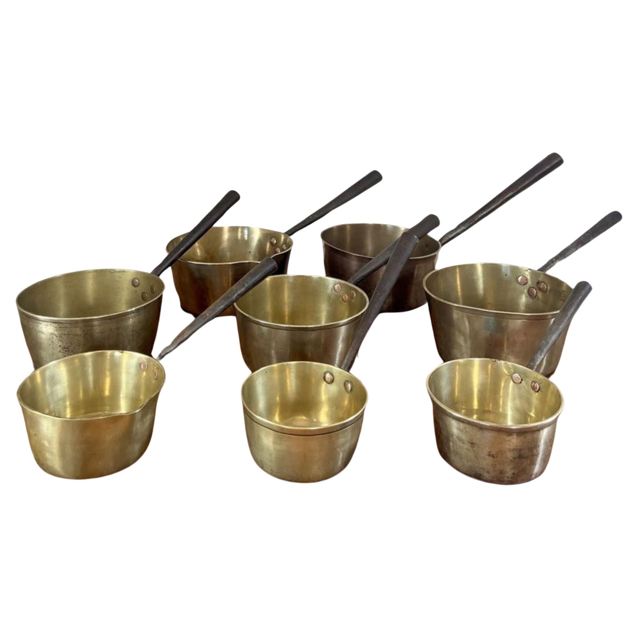 Large collection of antique Victorian heavy brass saucepans  For Sale